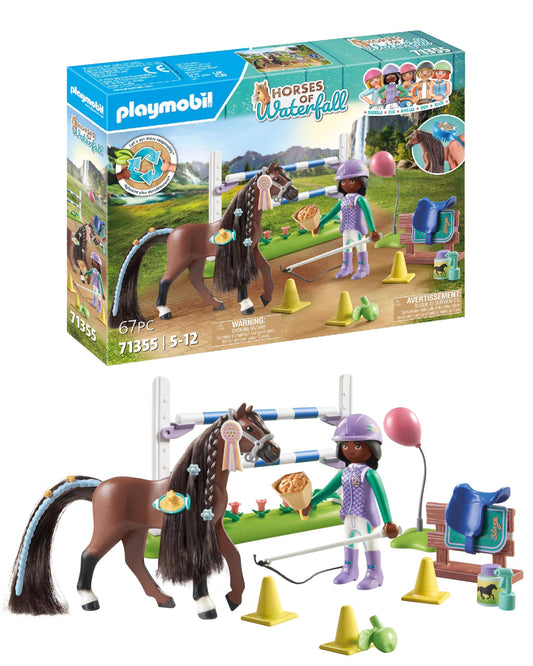 Playmobil Horses of Waterfall: Zoe rides Blaze over a jumping obstacle for adventurous play.