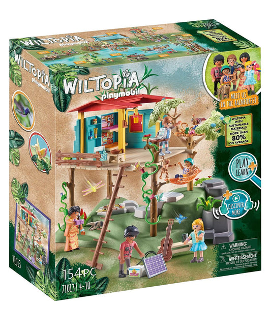 Playmobil Wiltopia Family Tree House exterior in lush rainforest setting, inviting imaginative play.