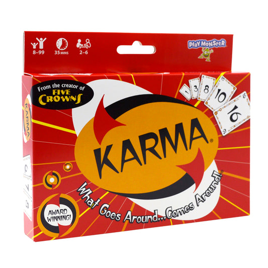 PlayMonster KARMA card game table setup for family play.