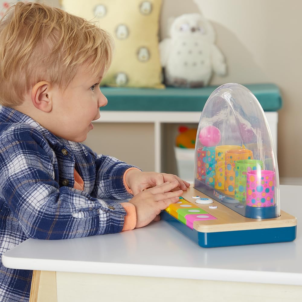 Playskool Little Wonders Pop-A-Tune ball pop action enhances cause-and-effect exploration.