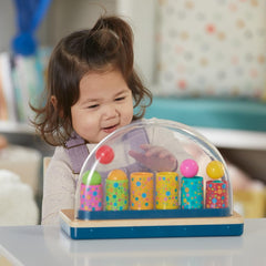 Playskool Little Wonders Pop-A-Tune supports early learning through cause-and-effect play.