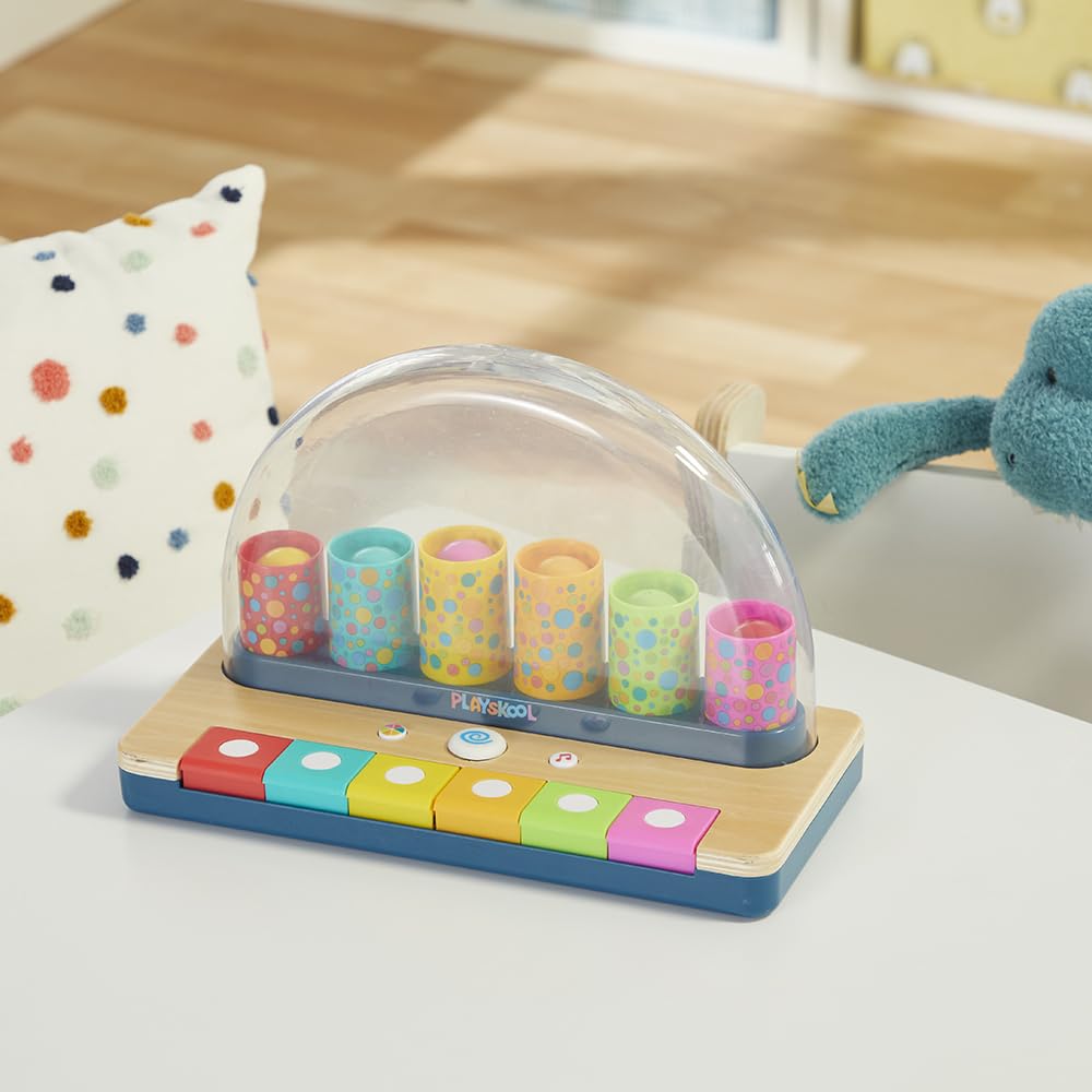 Playskool Little Wonders Pop-A-Tune promotes color matching during play sessions.
