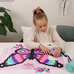 Plus Plus Puzzle by Number kids' creative session, ages 7+, engaging and educational.