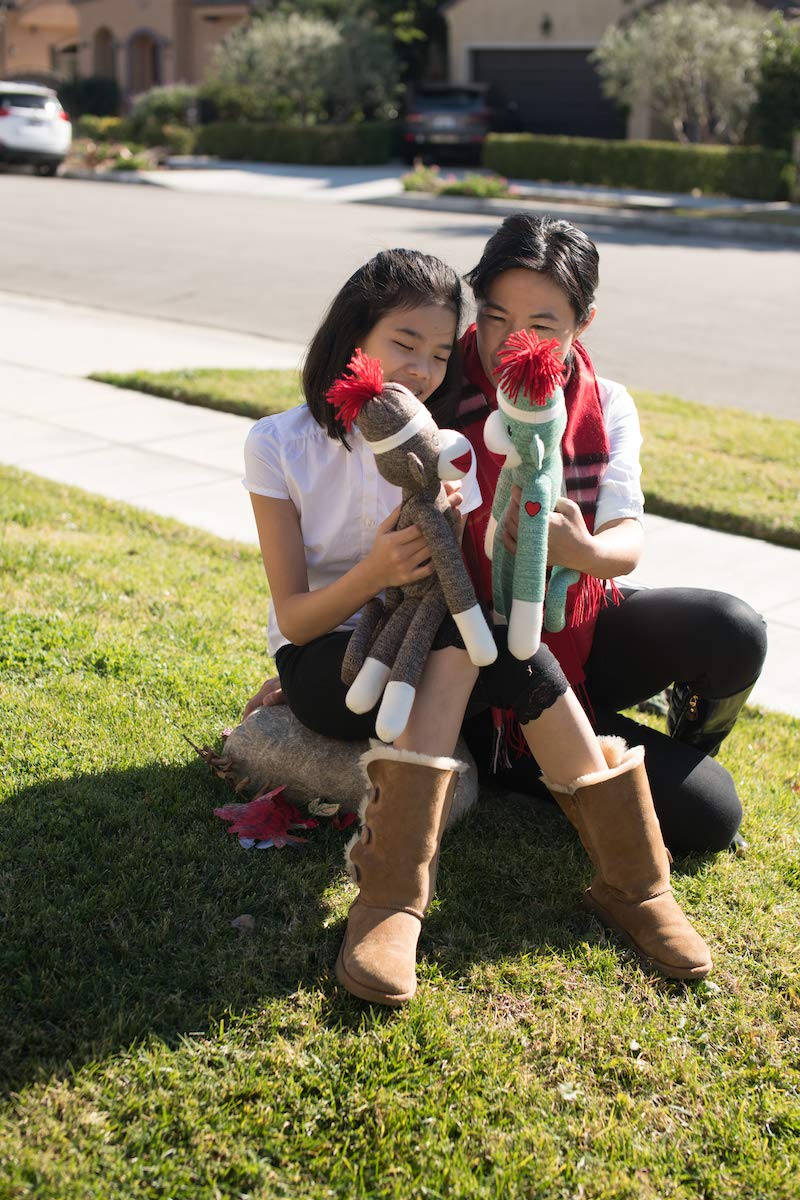 Plushland Brown Original Sock Monkey 20 inches length, a sizable companion for children.