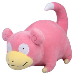 Pokémon Slowpoke plush close-up face shows soft fabric and friendly expression.