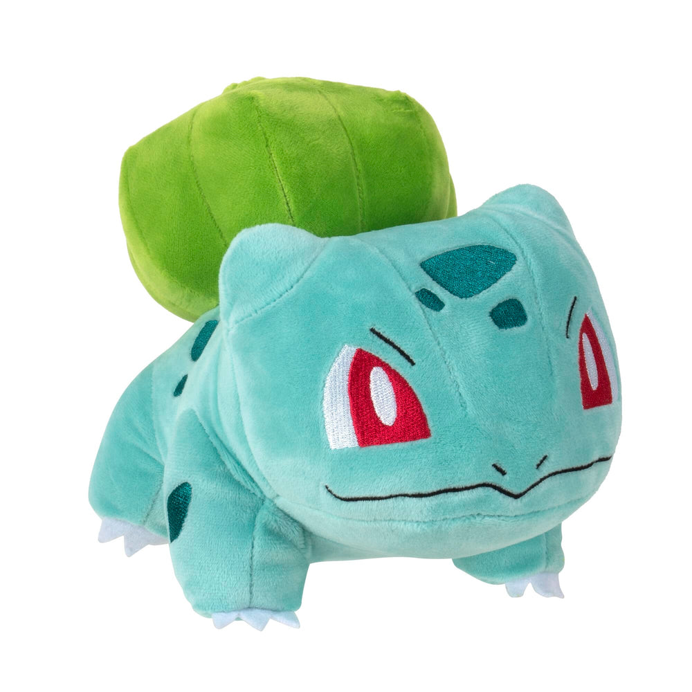 Pokemon Bulbasaur plush on a shelf inviting cuddling.