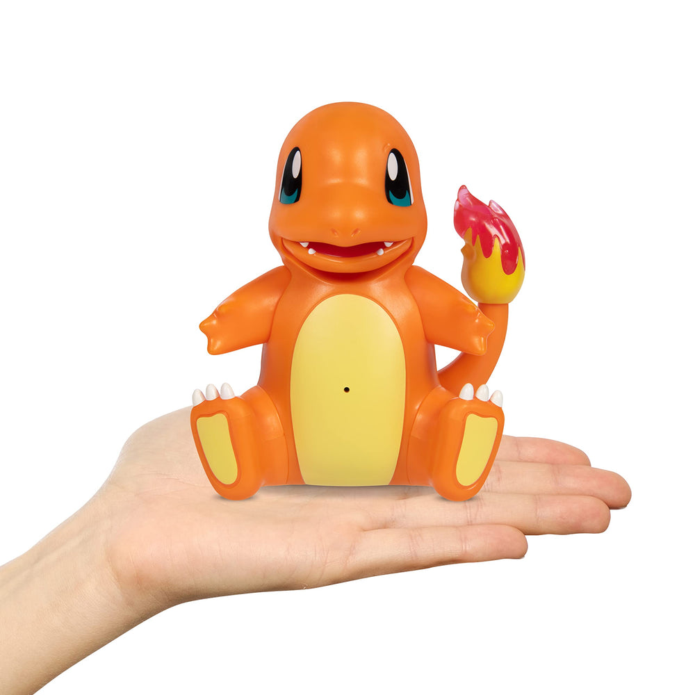 Pokémon My Partner Charmander glows its tail during interactive play