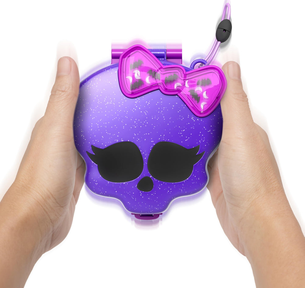 Polly Pocket Monster High playset casket-ball game adds interactive pretend play.