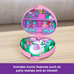Polly Pocket open birthday cake reveals an inkwell, a charming vintage feature