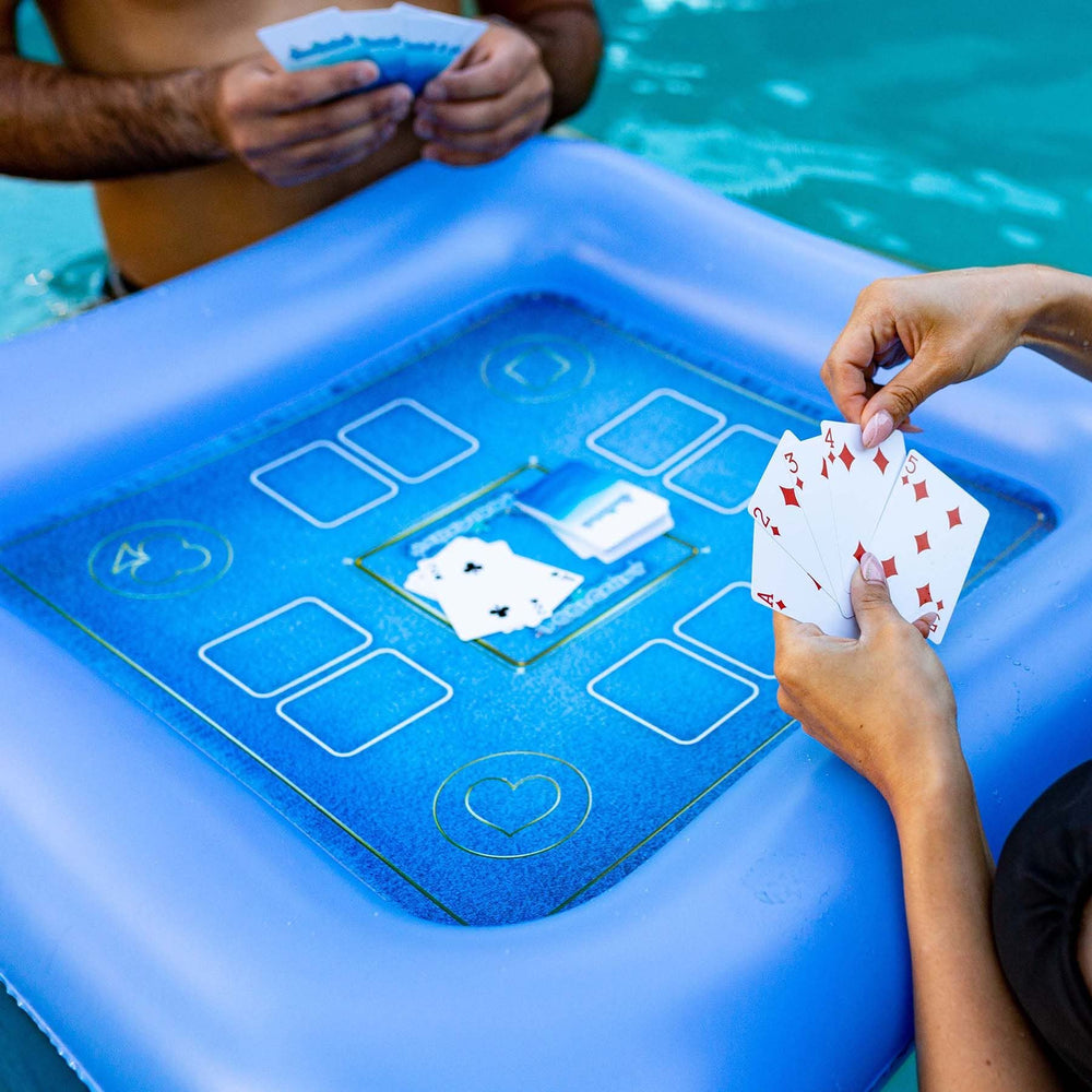 Poolcandy floating game table with waterproof cards for poolside play.