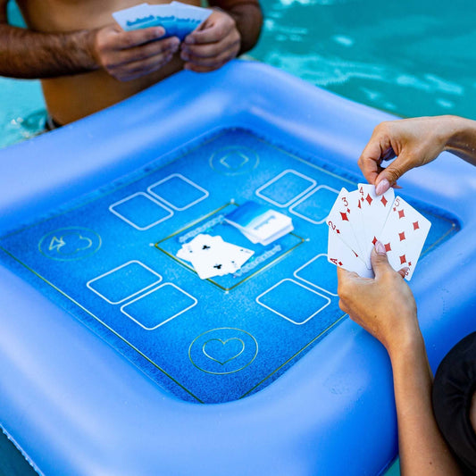 Poolcandy floating game table with waterproof cards for poolside play.