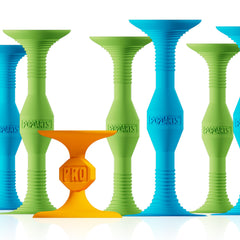 Popdarts Pro Pack blue and green darts on glass window for quick family play.