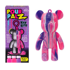 Pour Palz bear keychain with paint swirl adds a unique accessory to bags.