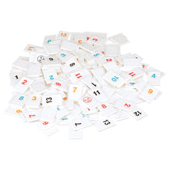Pressman Rummikub Six-Player Edition racks-and-tiles help organize turns smoothly.