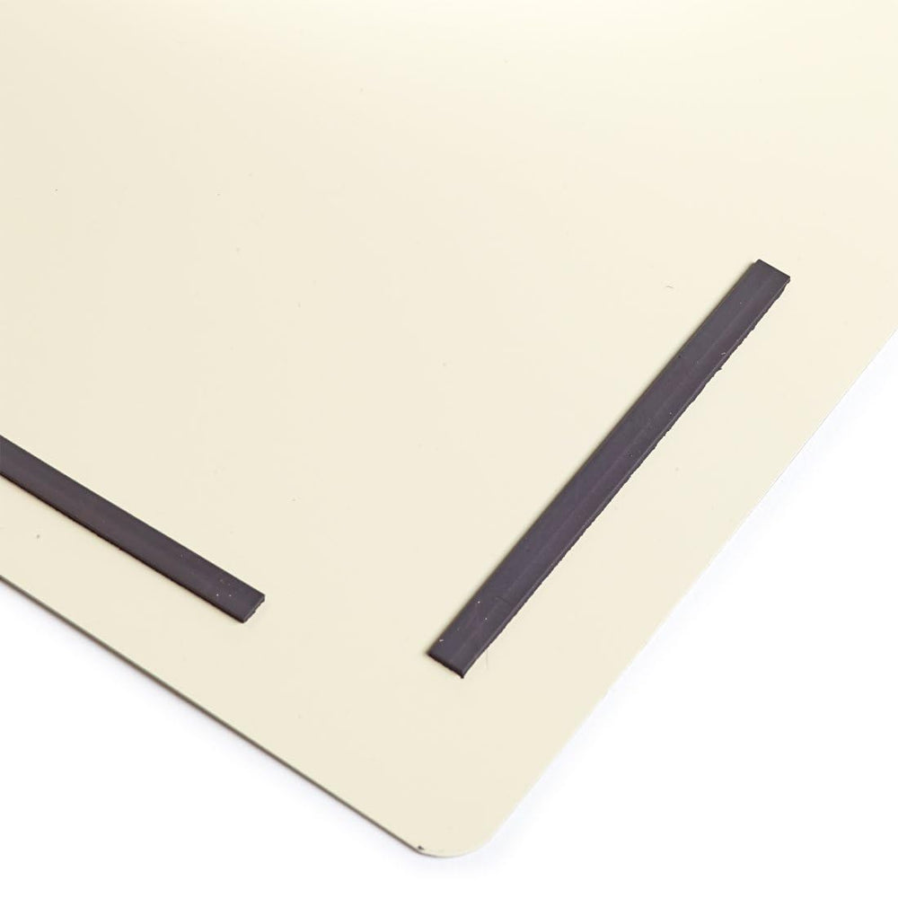 Prym folding stand with magnifier enhances layout accuracy during embroidery.