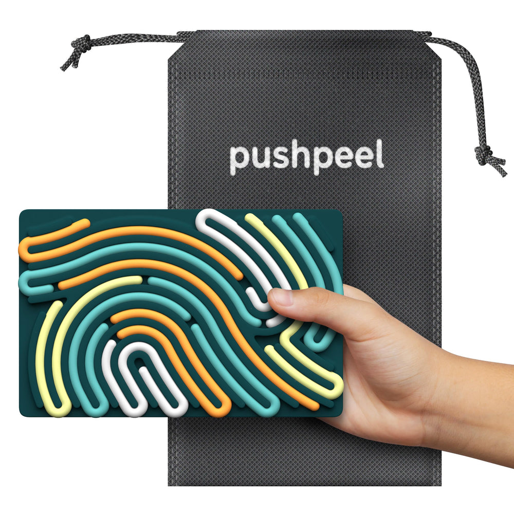 Pushpeel Sensory Board in use on plane for quiet entertainment