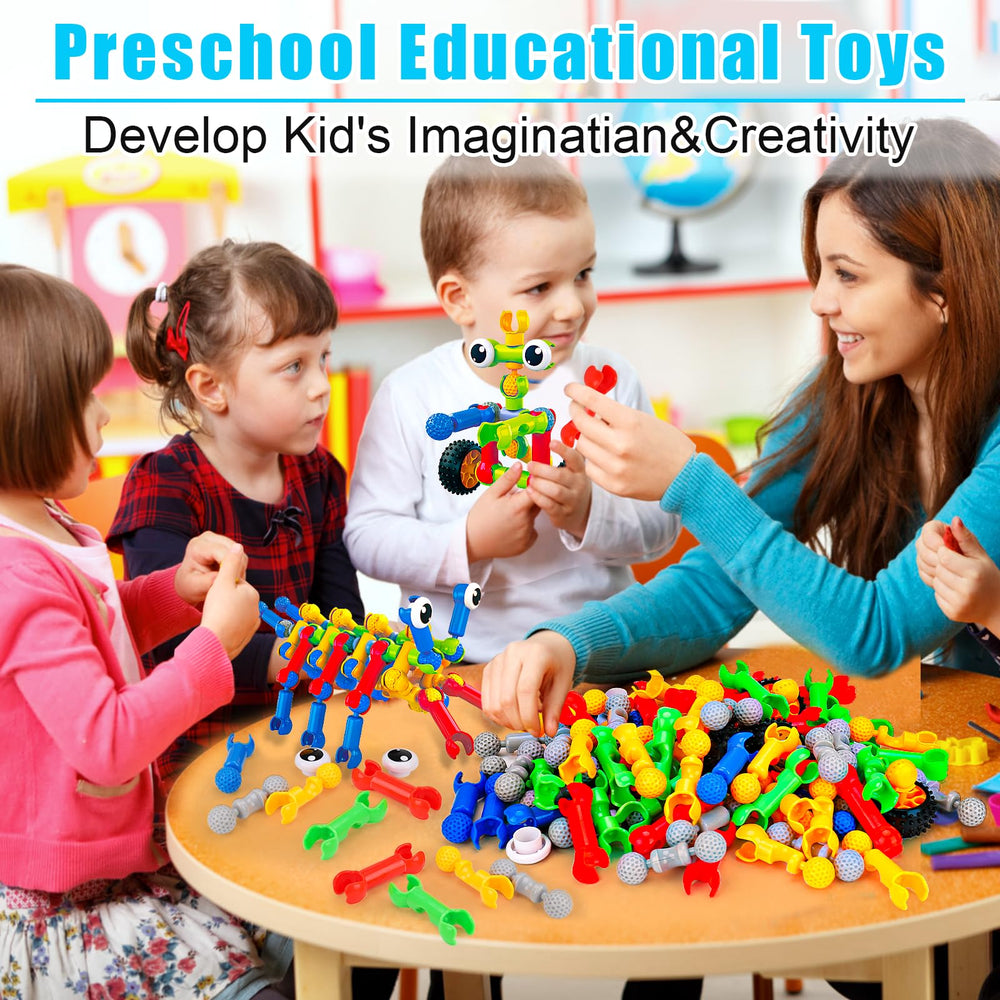 Qirptey group building activities promote teamwork with STEM blocks.