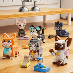 QLT QIAOLETONG ABS plastic cat figures provide durable, safe play for energetic kids.