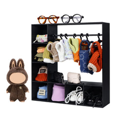 Rain Bunny doll closet with open hangers keeps outfits neatly organized.