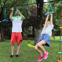 Rainbow Craft ninja obstacle kit set up in a backyard playground.