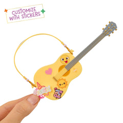 Rainbow High Sunny yellow doll in outfit detail shows colorful styling for creative dress-up.