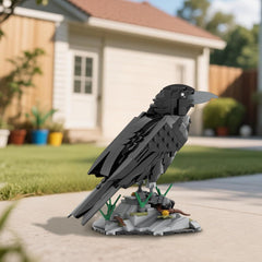 RCTRORCARY Raven perched on rock base creates a striking decor focal point.