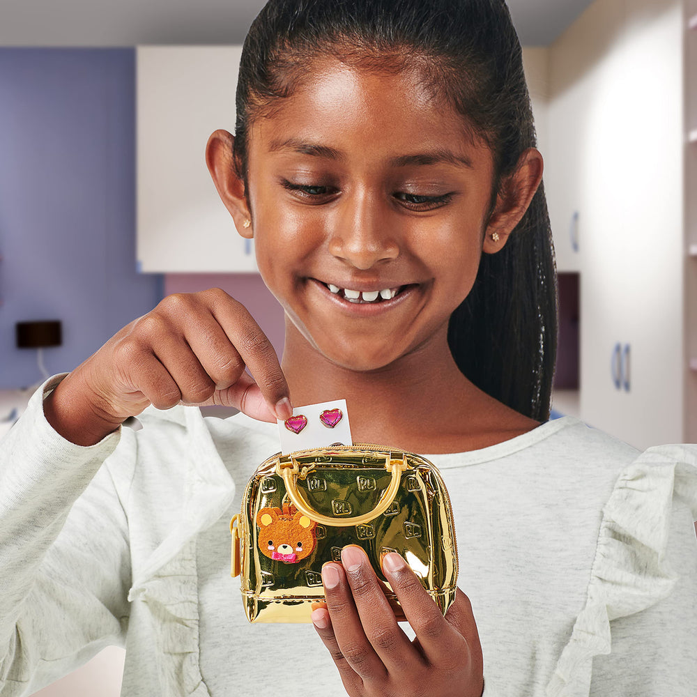 Real Littles Ultra-Luxe bags display case showcased for elegant storage.