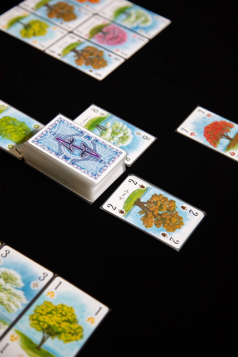 Renegade Arboretum card draw close-up showing vibrant garden cards for planning.