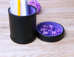 RERIVER dice cup on table with dice ready for a game