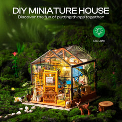 ROBOTIME Cathy’s Greenhouse interior view shows tiny furniture for imaginative play.