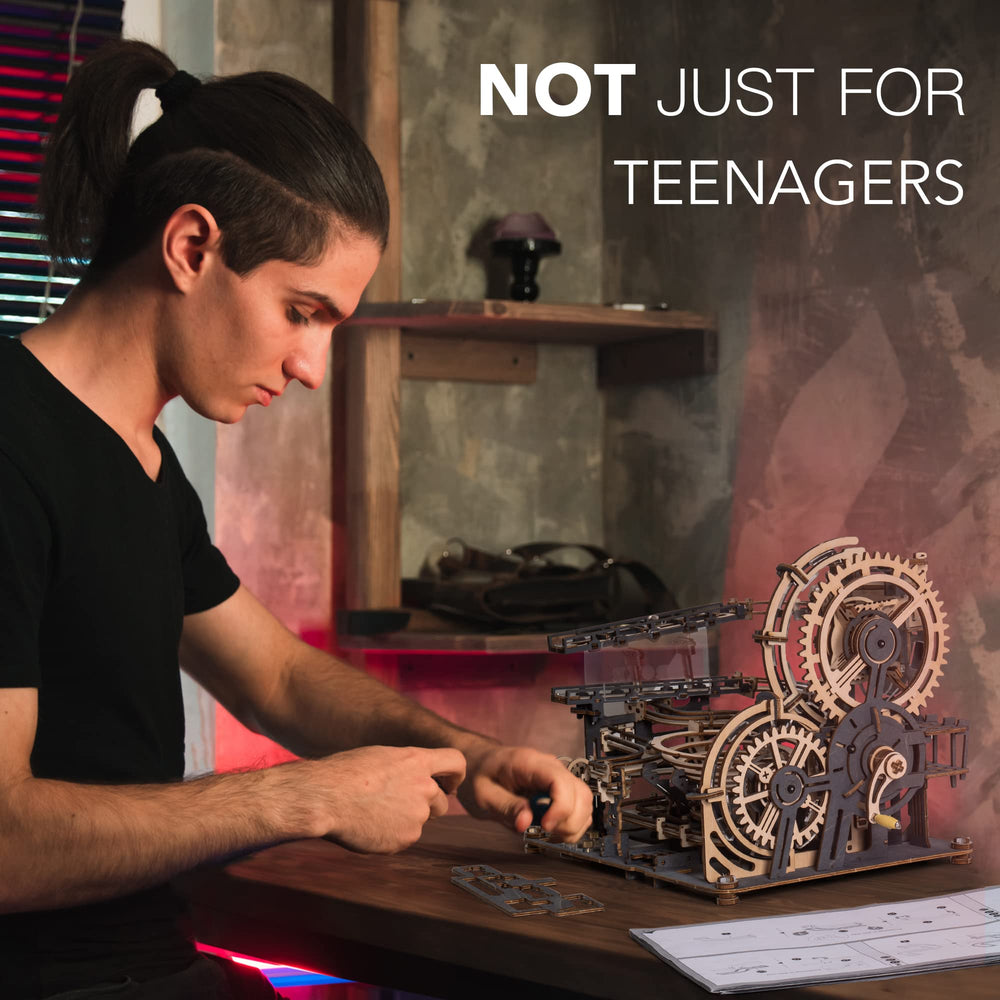 ROBOTIME instruction book and pieces arranged for clear building guide