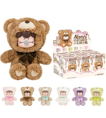 Robotime Nanci blind box bear on desk, playful display.