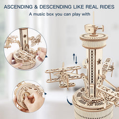 ROKR windup mechanism activates rotating tower and moving biplanes