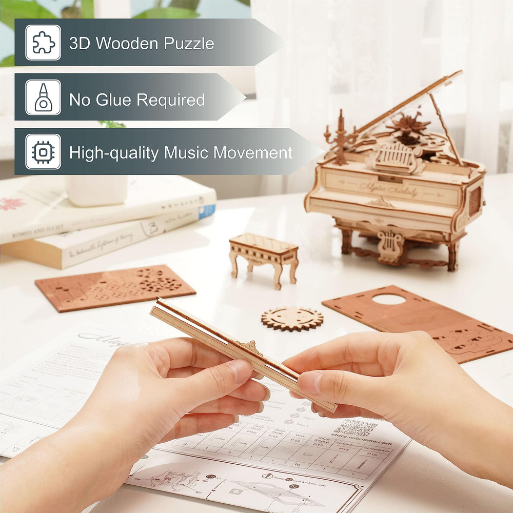 ROKR piano model with wind-up self-playing keys and visible movements