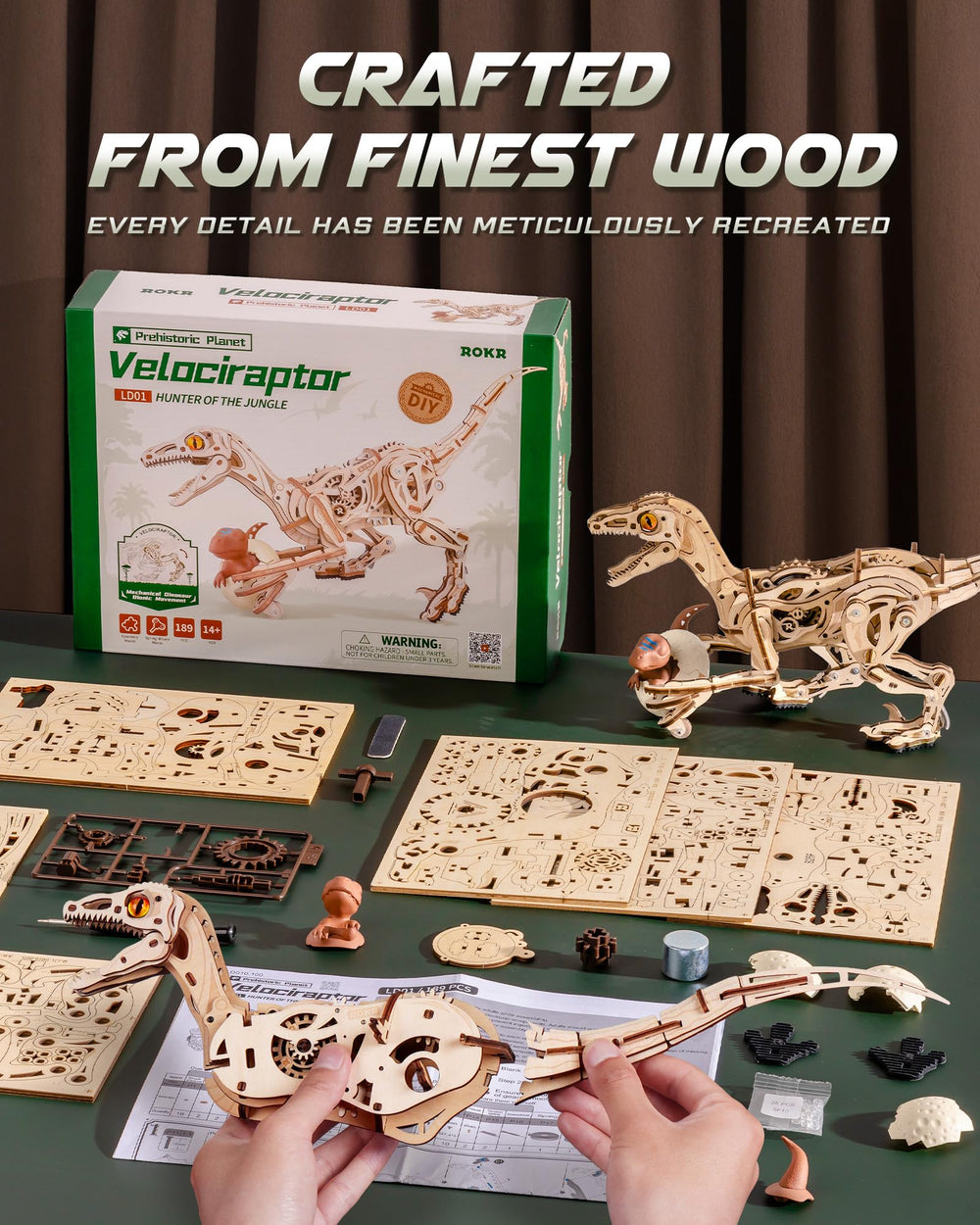 ROKR Velociraptor laser-cut pieces with numbered parts simplify assembly and learning.