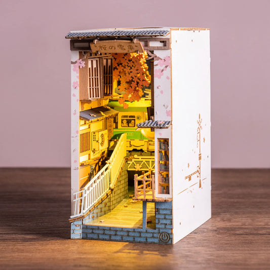 Rolife Sakura Densya river scene with glowing lights enhances display decor