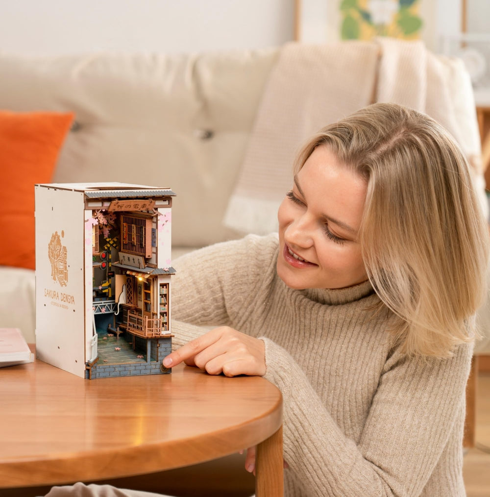 Rolife Sakura Densya signal lights illuminate the scene for cozy shelves