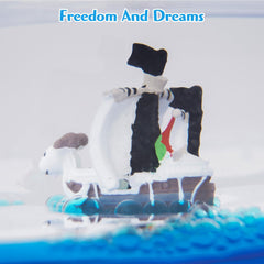 ROSSOM desk decor piece that doubles as stress-relief visual when shaken.
