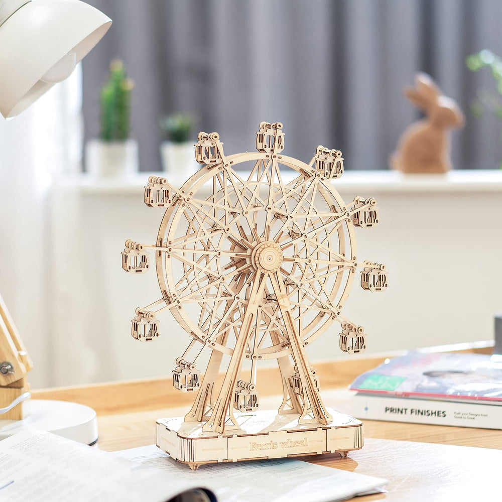 Rowood Ferris Wheel puzzle pieces spread; natural wood and smooth fit