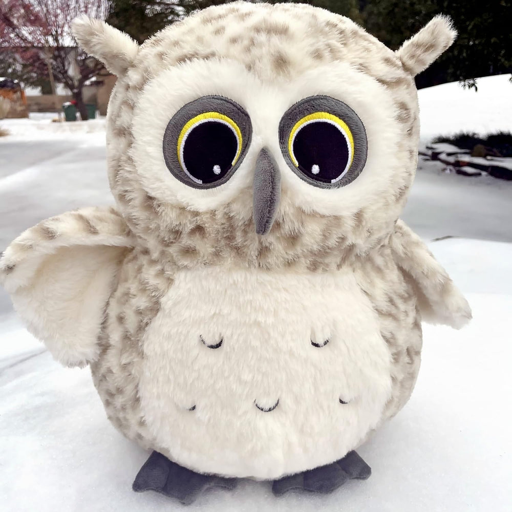 Ryttir snowy owl plush with oversized luminous eyes offers comforting companionship.