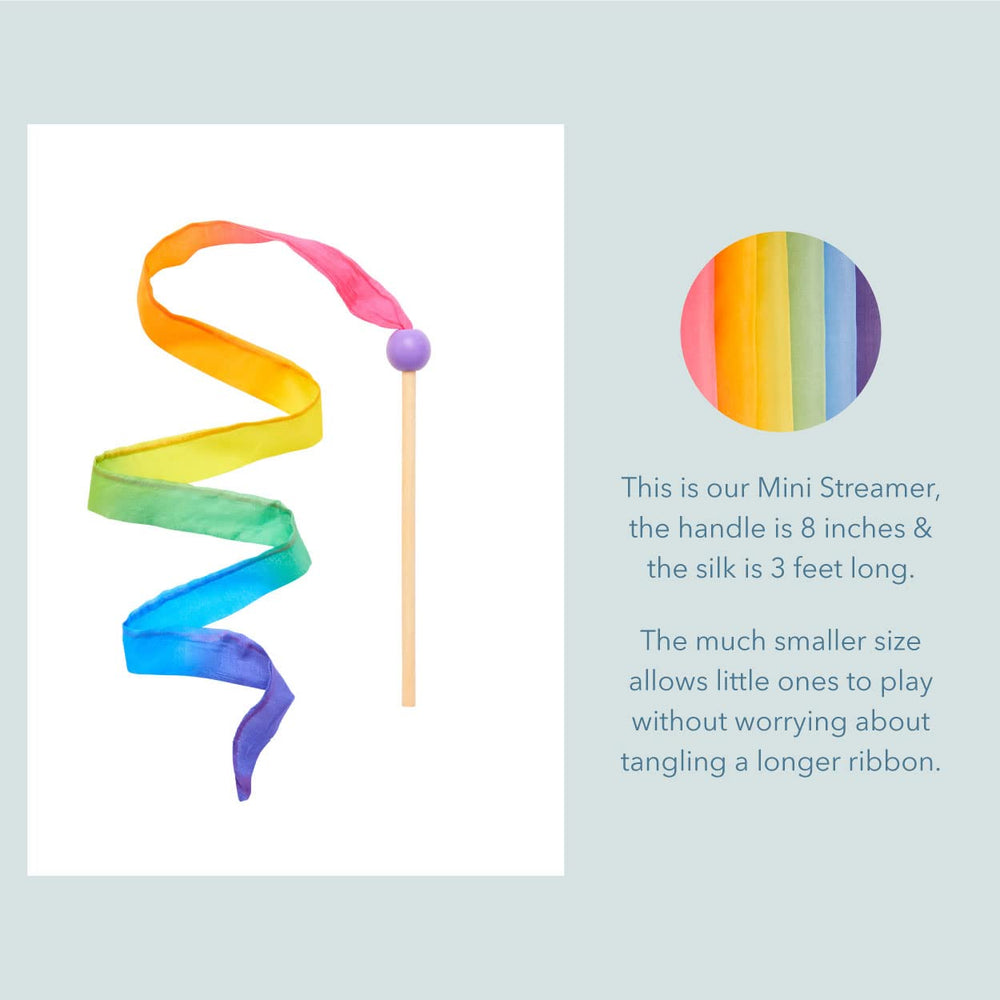 Sarah's Silks Mini Rainbow Streamer used as a princess wand for pretend play.