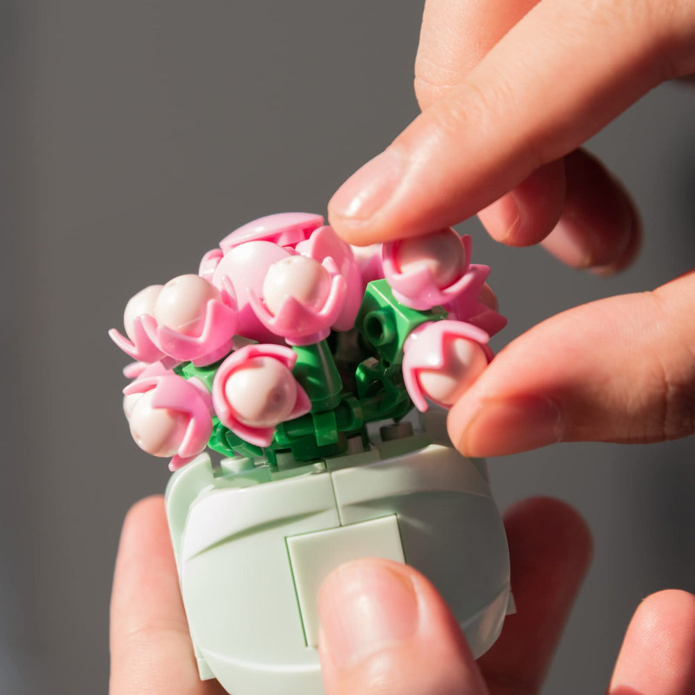 SATHIBI real-looking succulents add color and texture to desk decor.