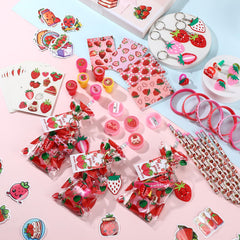 Sayglossy strawberry keychains add portable keepsakes for guests.