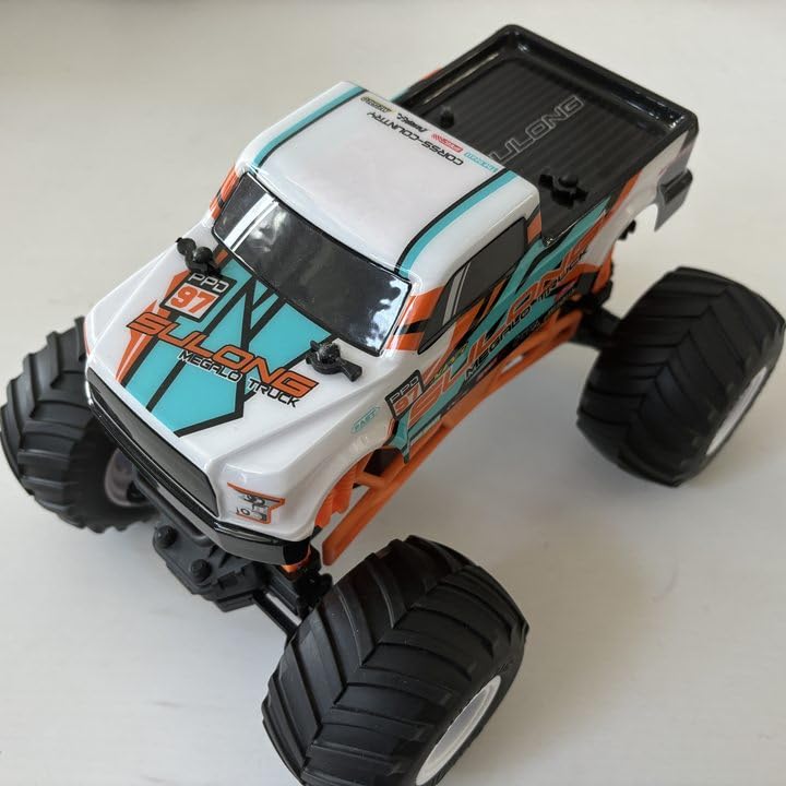 Scientoy monster truck with off-road tires for stable outdoor handling.
