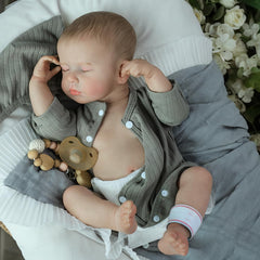 SCOM doll face with rooted lashes for an authentic newborn look