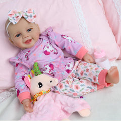 SCOM doll face with hand-sewn eyelashes for gentle, lifelike detail.