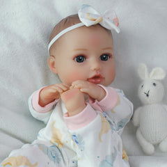 SCOM doll with textured scalp invites tactile discovery during pretend care.