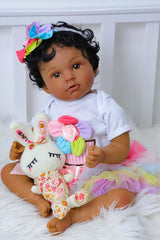 SCOM gift box includes pacifier, bottle, outfit, headband, and birth certificate