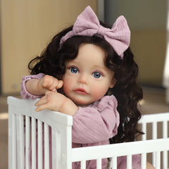SCOM lifelike reborn doll wearing included clothes set for imaginative fashion play.