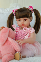 SCOM lifelike reborn doll face with gentle features for imaginative play.